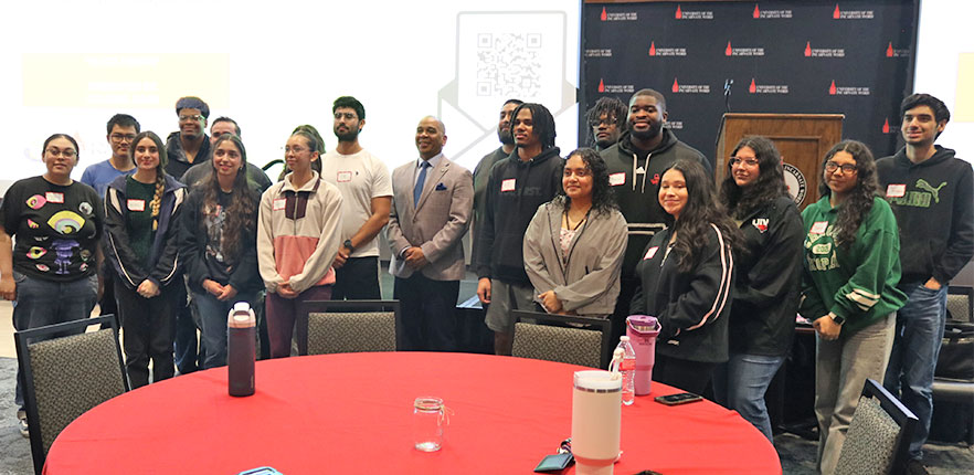 Chaplain Davis with symposium attendees