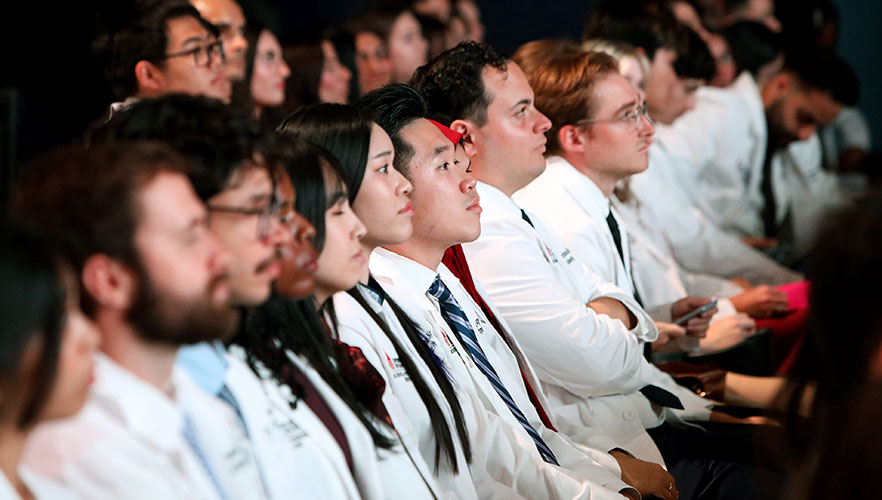 Students at white coat ceremony
