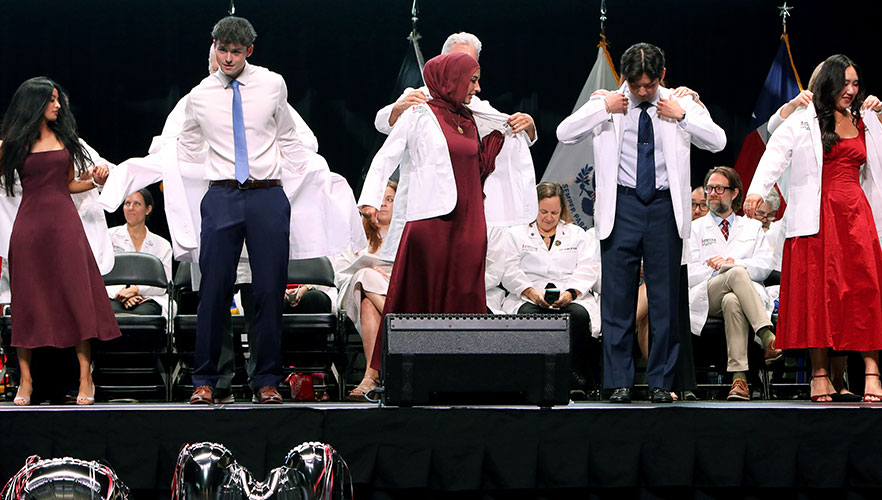 Students at white coat ceremony