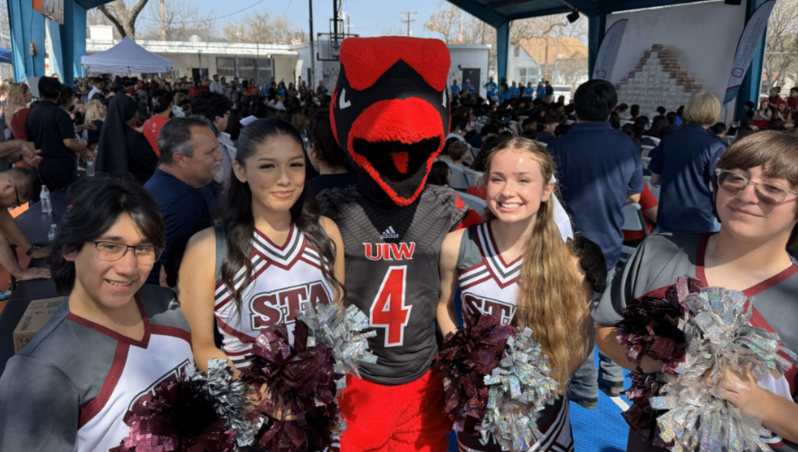 Red the Cardinal and attending students