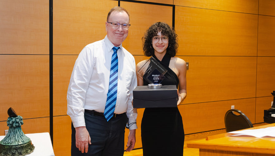 Abigail (Abby) M. Allen-Barria accepting award