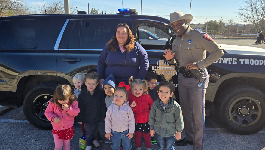 Students in front of trooper car