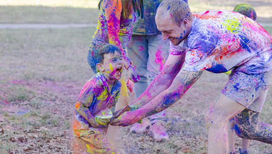 Attendees at Holi color throw