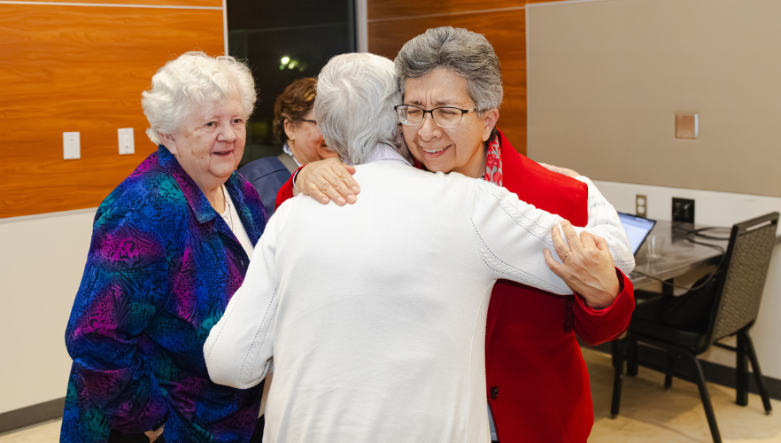 Sr. Teresa Maya, CCVI, hugging other CCVI Sister