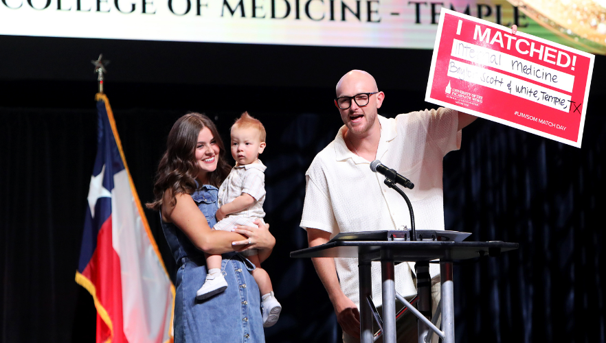 Medical student sharing Match Day results with family