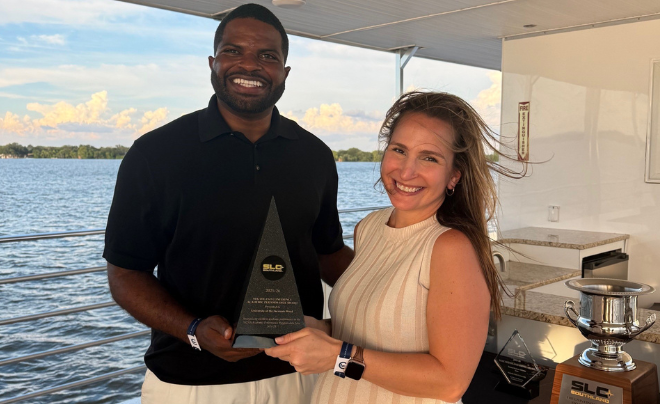 Photo Caption (L-R): Southland Conference Commissioner, Chris Grant and UIW Faculty Athletics Representative, Dr. Laura Cannon / Grant presents Cannon with Southland Conference Academic Performance Award