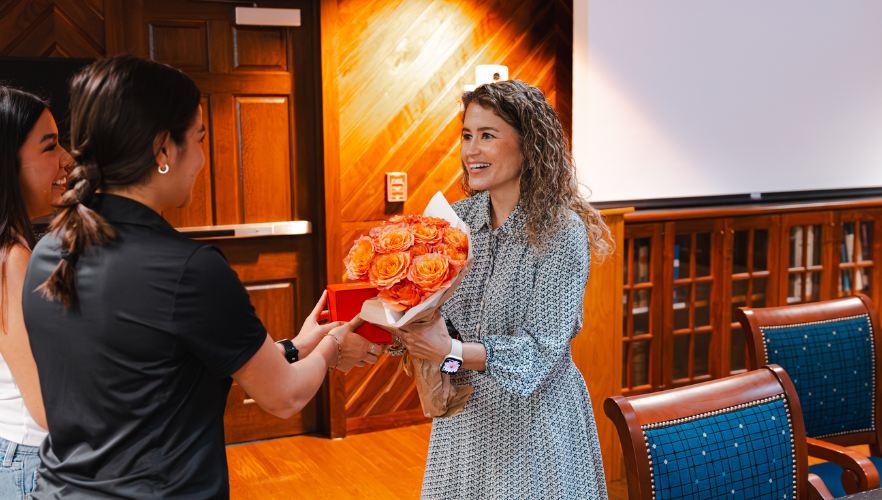 Ada Saenz receiving flowers
