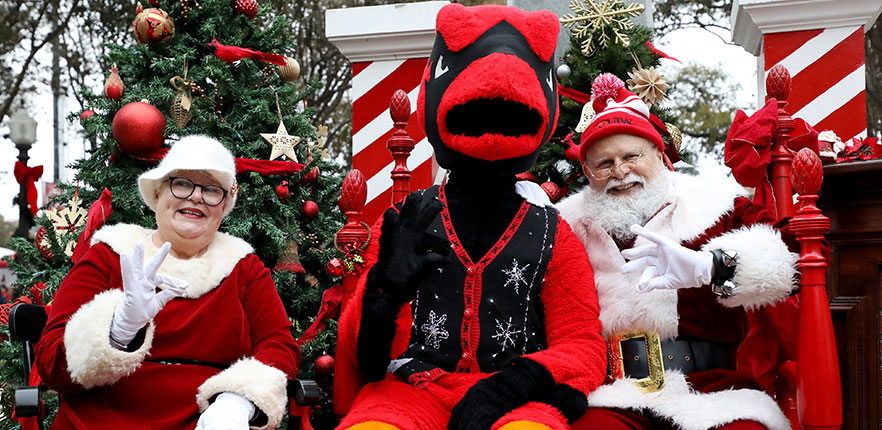 Red the Cardinal With Santa Clause and Mrs. Clause