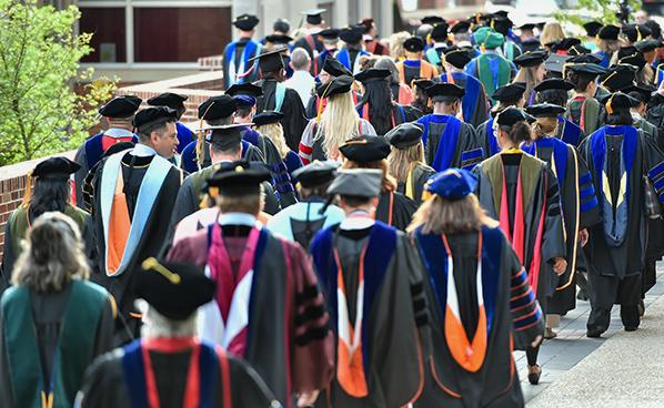 Academic Procession advancing through campus