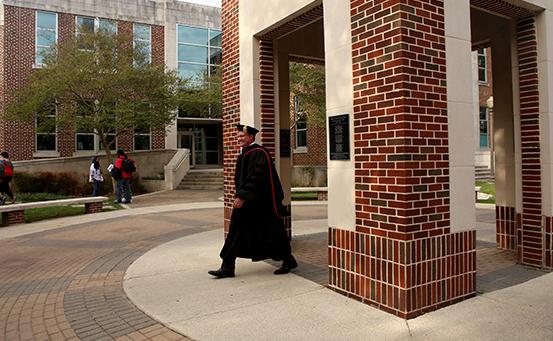 Dr. Evans walks through the clock tower