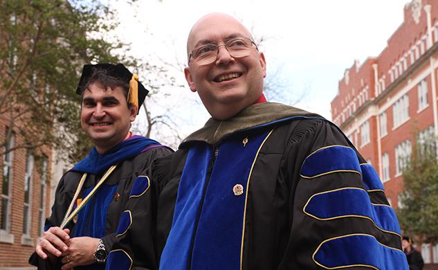 Two Faculty Members during procession