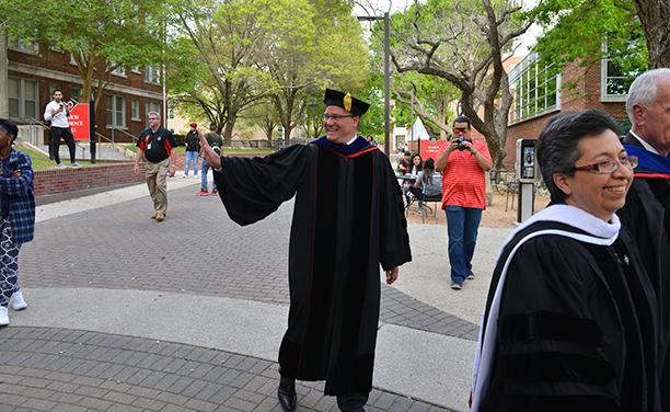 Dr. Evans waves at the crowd