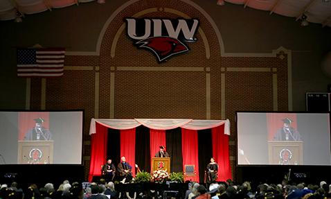 Dr. Evans gives speech in stadium