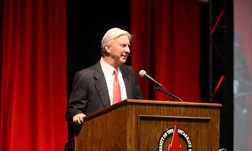 Chairman Charlie Lutz gives a speech