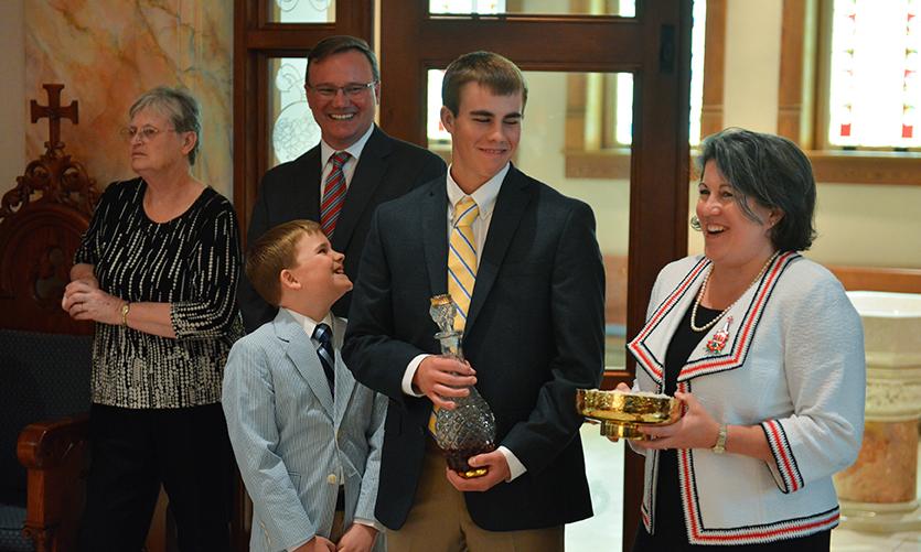 Dr. Evans' Family preparing to bear the Gifts