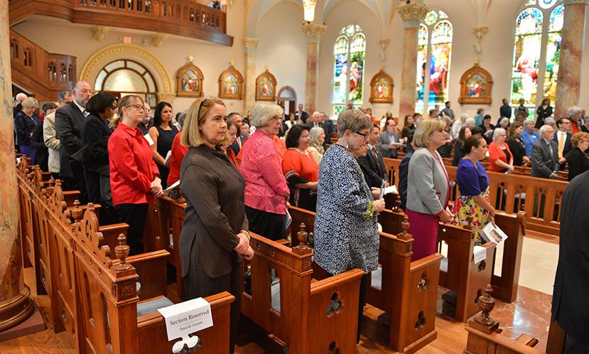 Attendees participate in the Eucharistic Celebration