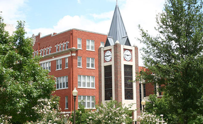 UIW clocktower surrounded by flowers