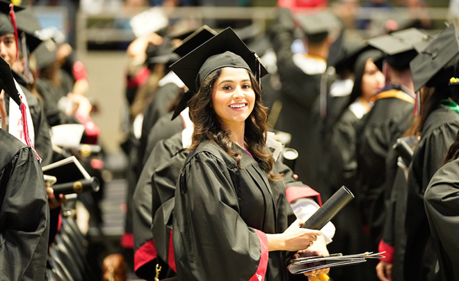 UIW graduate in cap and gown