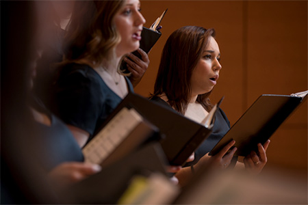 Choir singers singing