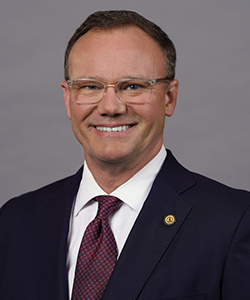 Dr. Thomas M. Evans, President