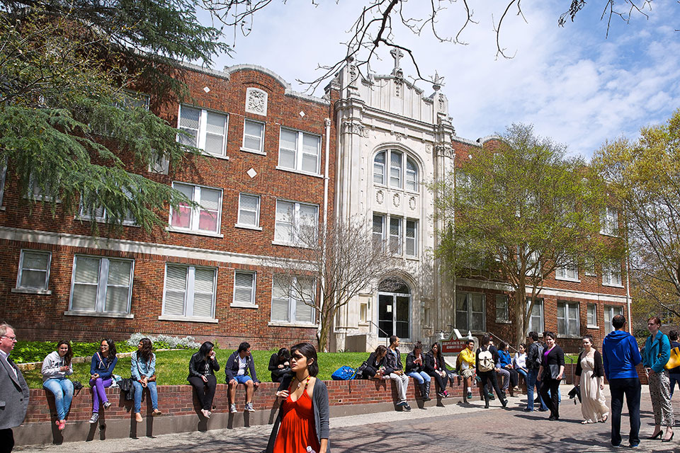 Students and community in front of Dubuis Hall 