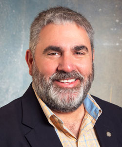 A headshot of Dr. Javier Clavere