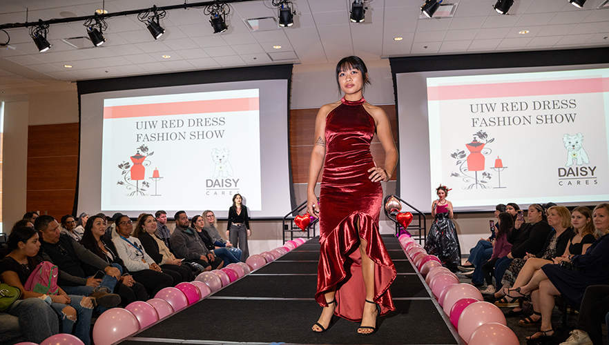 Model on stage at Red Dress Fashion Show
