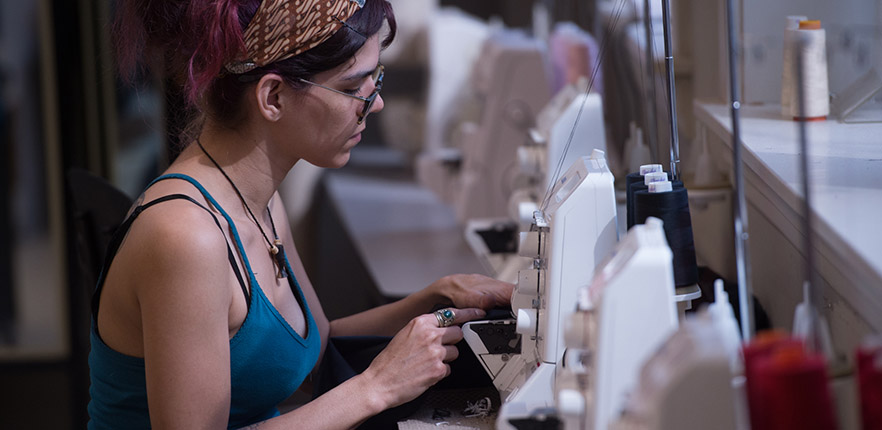 student at a sewing machine