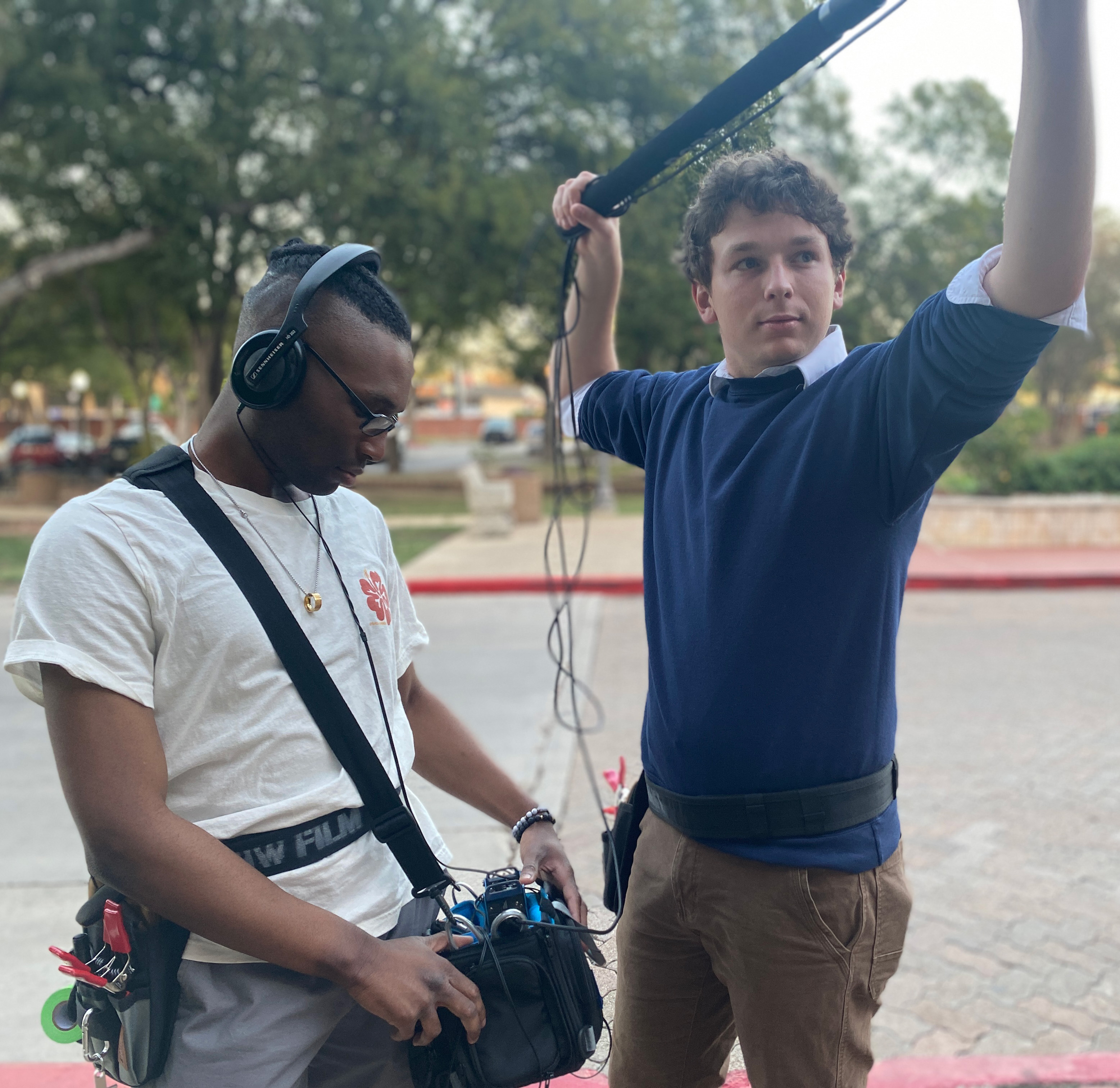 Two UIW students using film equipment on campus