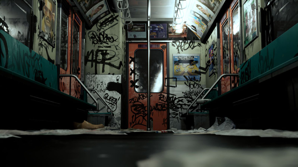 inside of a subway train with graffiti