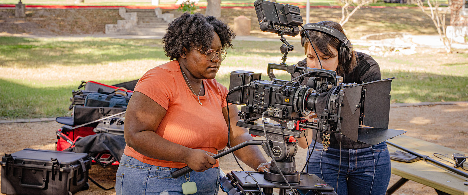 UIW students working on a film project on campus