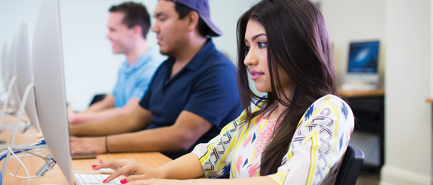 Close up of communication arts student in class