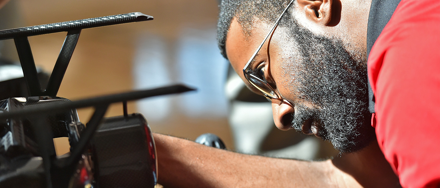 Engineering student working on an UAV Close-Up hero shot