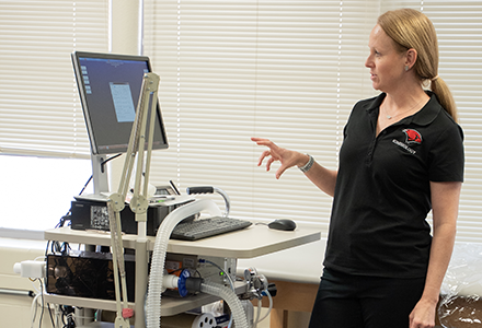 Instructor preparing to give metabolic test