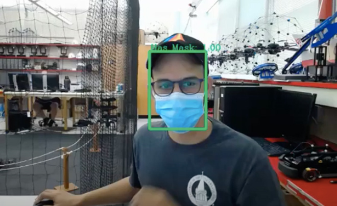 Lab team member tests the mask detection tool