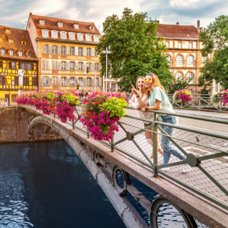 girls on a bridge in Strasbourg, France