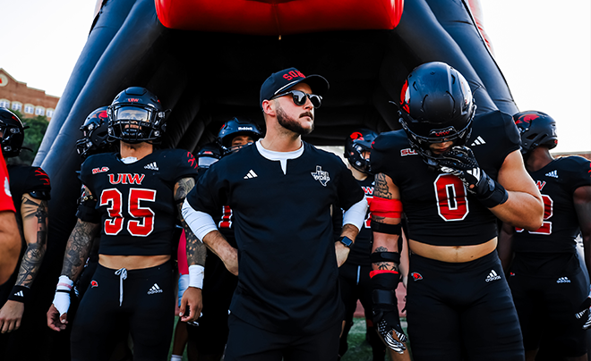 Football players and coach